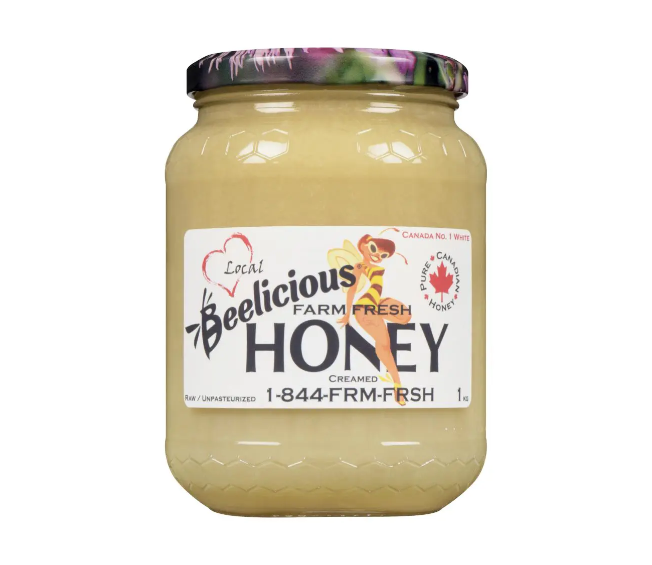 A jar of Beelicious honey with a floral lid.